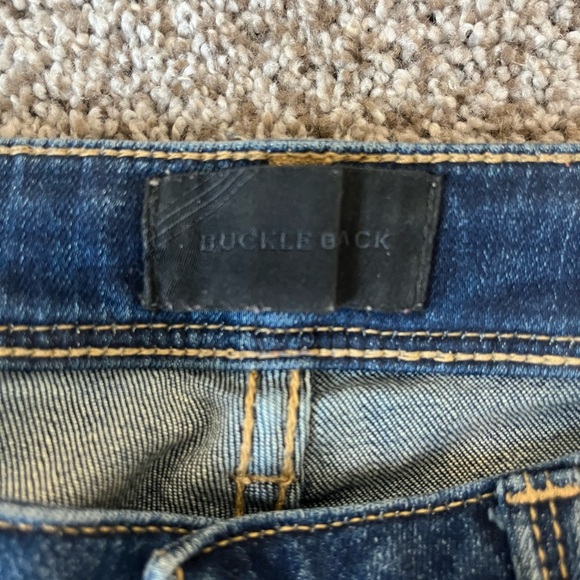 Buckle Dark Blue Distressed Skinny Jeans - Picture 2 of 5